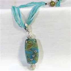 Exotic Aqua Lampwork Pendant on Aqua Seed Bead Necklace