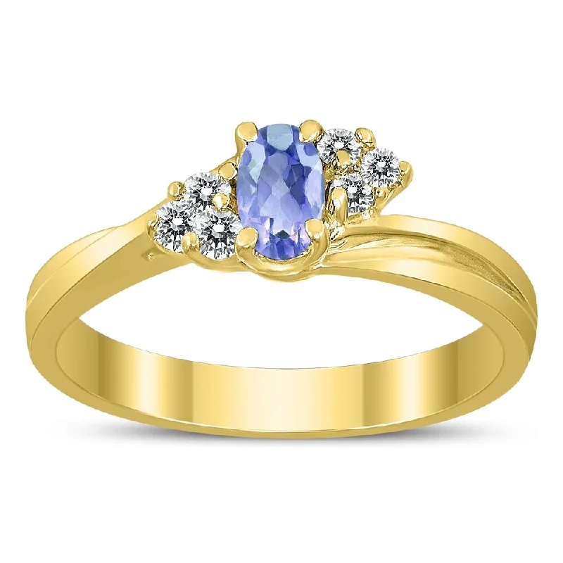 5X3MM Tanzanite and Diamond Twist Ring in 10K Yellow Gold