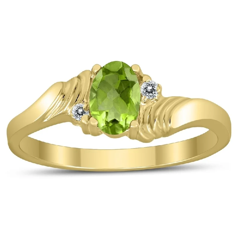 6X4MM Peridot and Diamond Wave Ring in 10K Yellow Gold