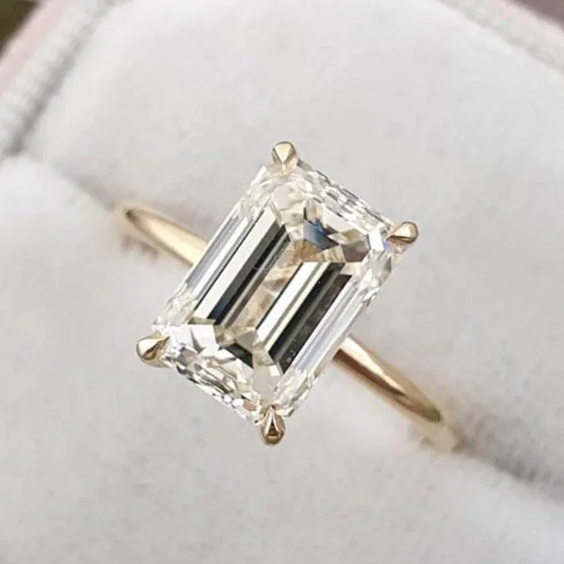 14 K Yellow Gold Emerald Shape Moissanite Engagement Ring