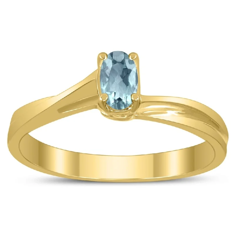 Solitaire Oval 5X3MM Aquamarine Gemstone Twist Ring in 10K Yellow Gold