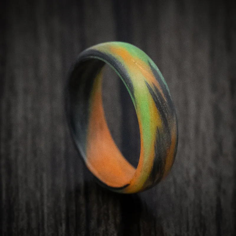 Carbon Fiber Men's Ring with Orange and Green Glow Marbled Design